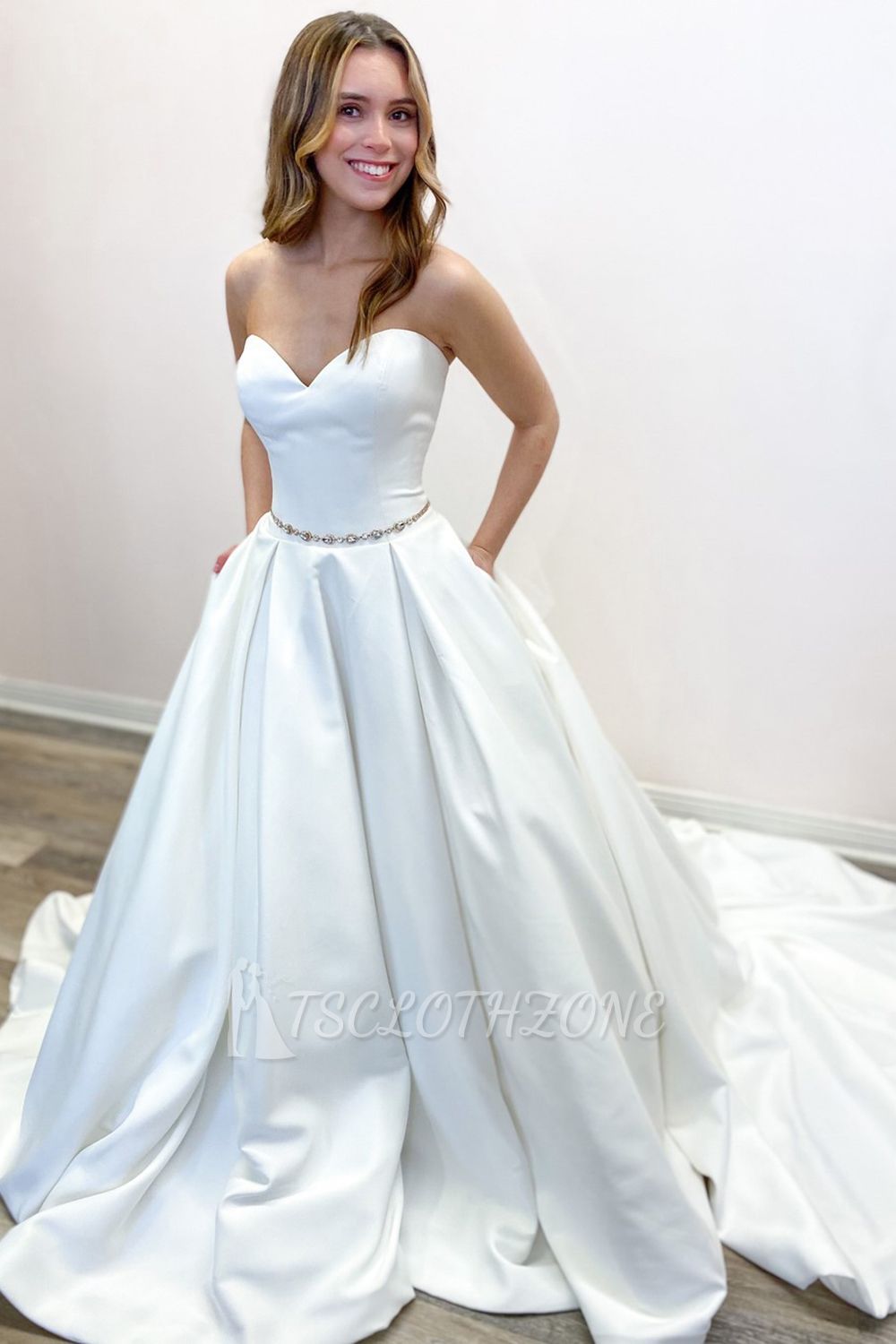 A-Line Floor-length Sweetheart Backless Wedding Dress With Ruffles Pockets