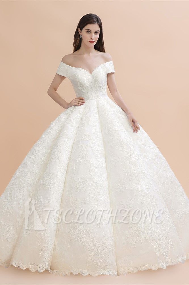 Elegante schulterfreie Brautkleider aus weißer Spitze mit weißen Spitzenapplikationen