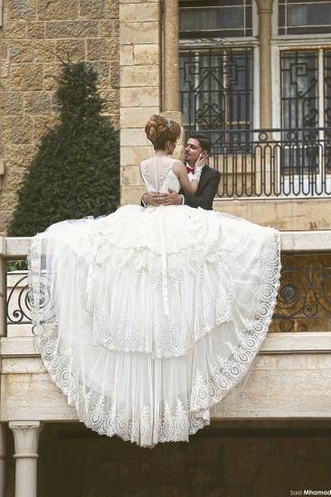 Wunderschönes, bördelndes Spitze-Ballkleid-Hochzeitskleid 2022 Neue Ankunfts-Brautkleid mit langem Zug_4