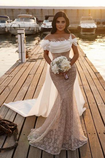 Stunning off-the-shoulder mermaid wedding dress with cape